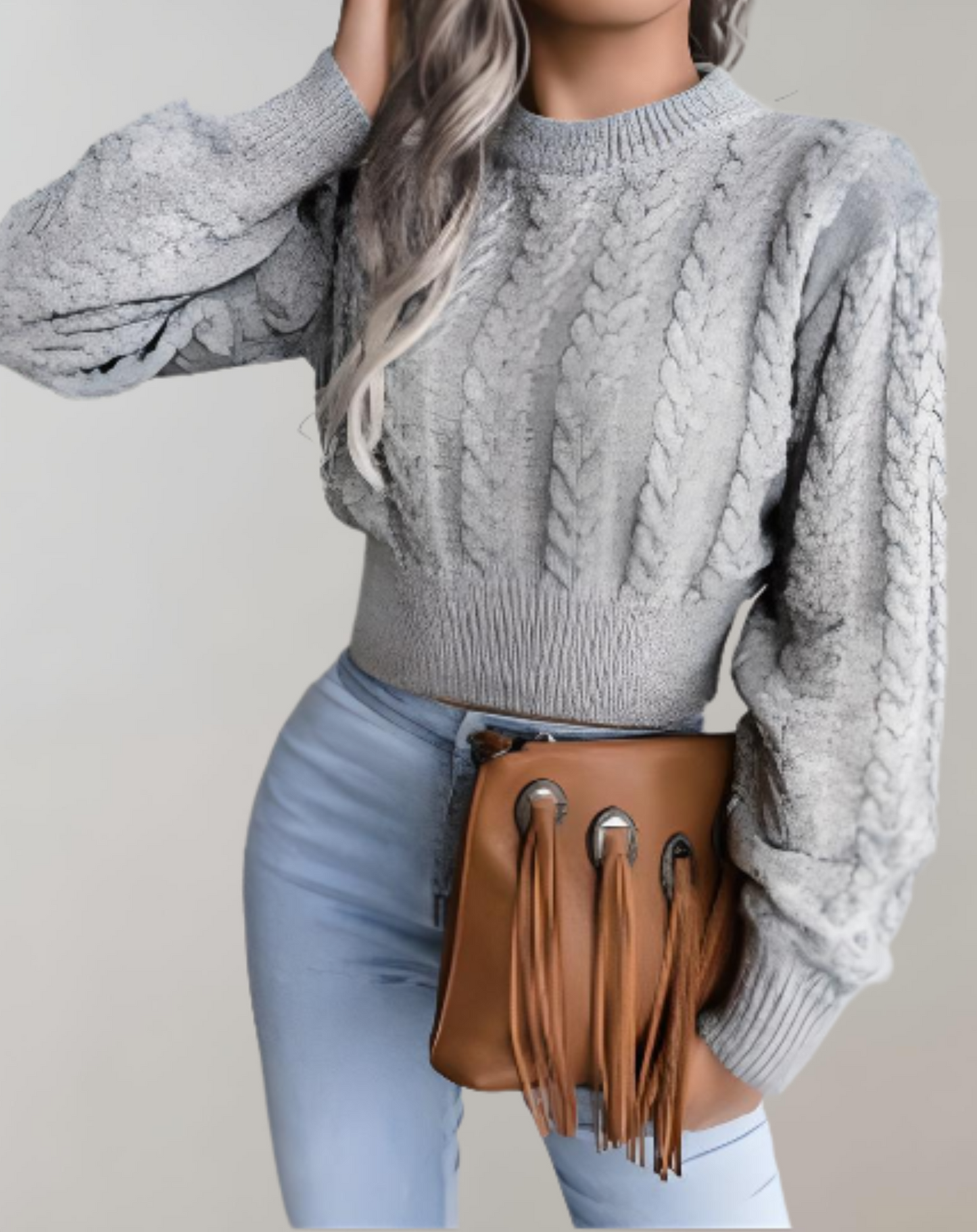 MODISHA - Een cropped trui met een subtiel gedraaid touwpatroon