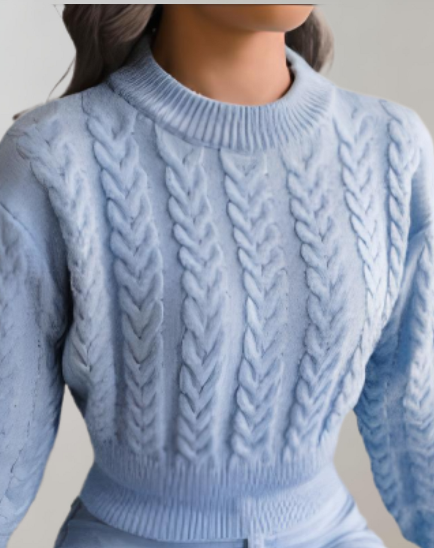MODISHA - Een cropped trui met een subtiel gedraaid touwpatroon